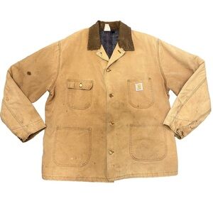 Vintage Carhartt tan button up chore coat distressed utility rug winter